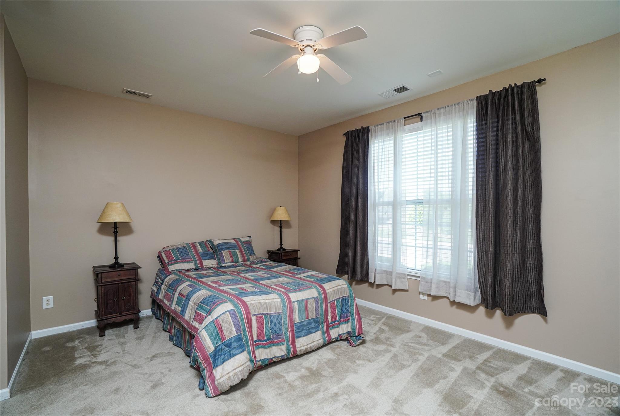 662 Amethyst Circle Fort Mill, SC 29708 - Photo 10 of 34 a bedroom with a bed and a window