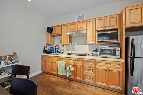 a view of room with wooden floor and air conditioner