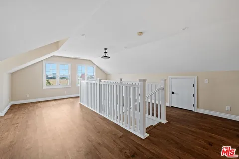 a view of livingroom with furniture and windows