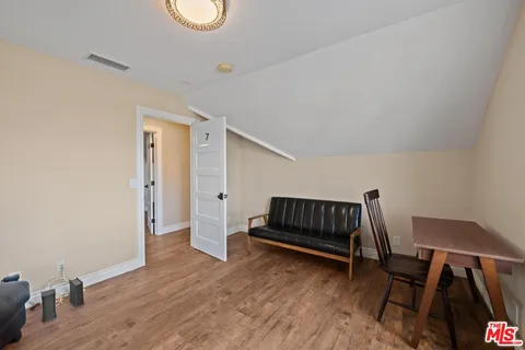 a bathroom with a sink a mirror and vanity