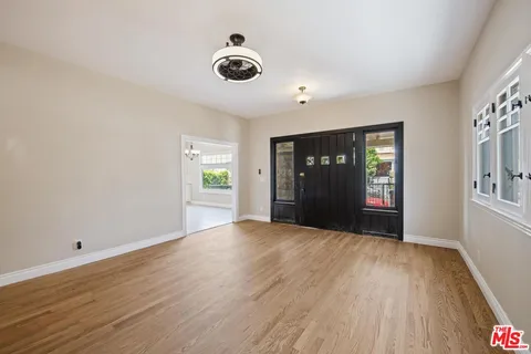 a view of a livingroom with wooden floor
