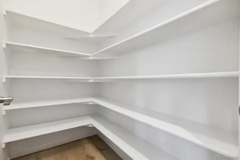 a view of an empty walk in closet