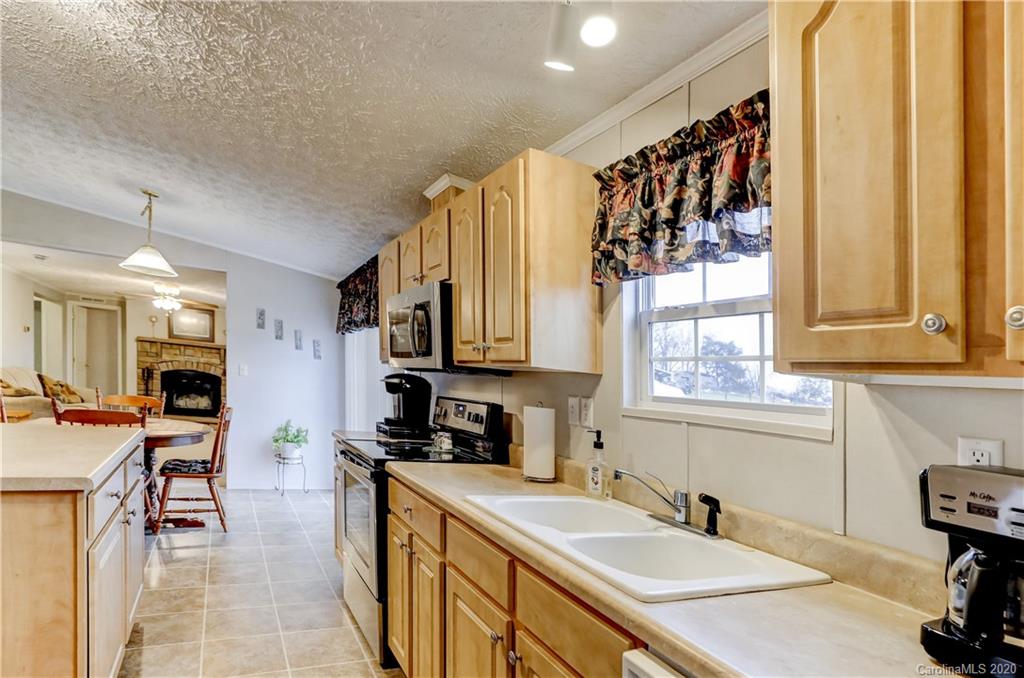 687 Fayette Road York, SC 29745 - Photo 16 of 48 a kitchen with stainless steel appliances a sink and a refrigerator