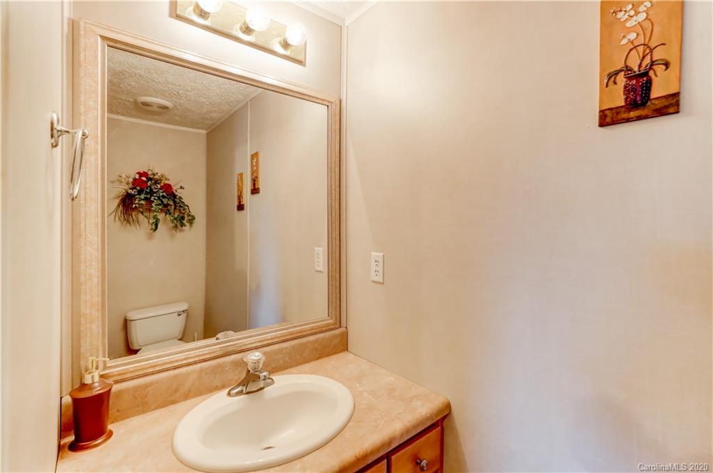 687 Fayette Road York, SC 29745 - Photo 18 of 48 a bathroom with a sink and a mirror