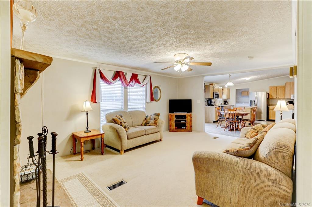687 Fayette Road York, SC 29745 - Photo 21 of 48 a living room with furniture and a flat screen tv