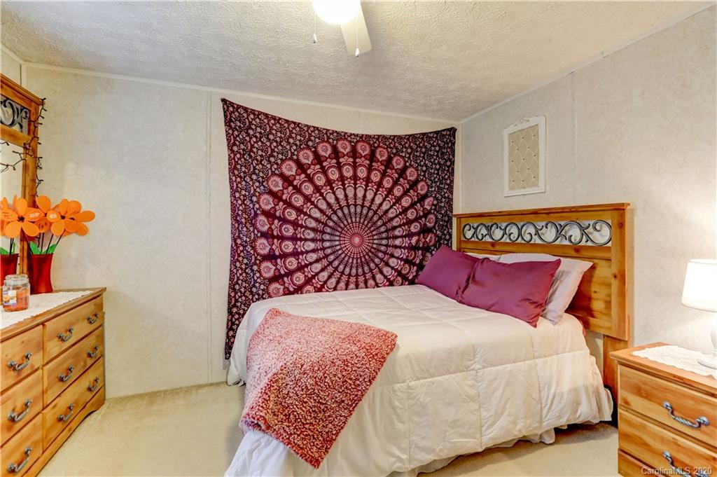 687 Fayette Road York, SC 29745 - Photo 24 of 48 a bedroom with a bed and window