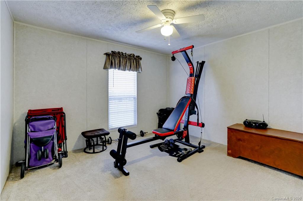 687 Fayette Road York, SC 29745 - Photo 26 of 48 a view of a room with gym equipment