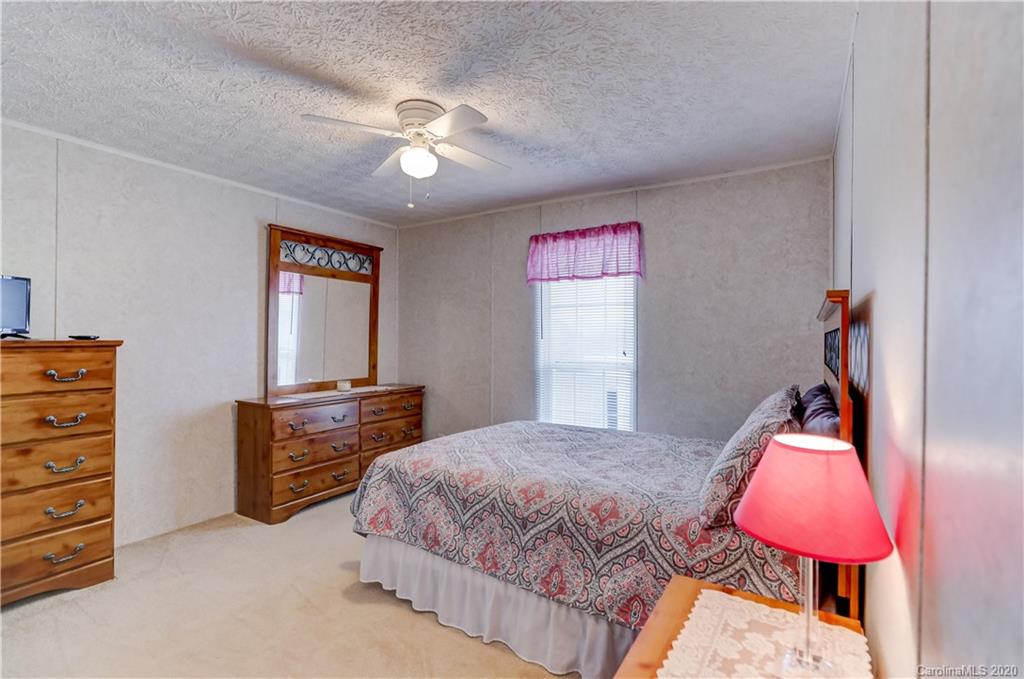 687 Fayette Road York, SC 29745 - Photo 30 of 48 a bedroom with a bed and dresser