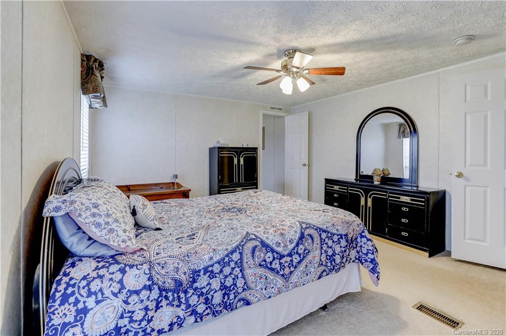 687 Fayette Road York, SC 29745 - Photo 35 of 48 a bedroom with a bed and a television