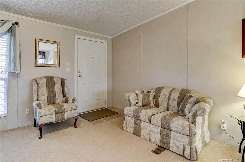 687 Fayette Road York, SC 29745 - Photo 5 of 48 a living room with furniture and a couch