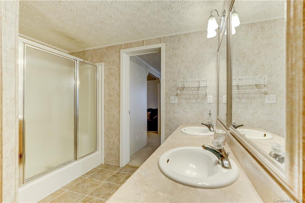 687 Fayette Road York, SC 29745 - Photo 42 of 48 a bathroom with a sink and a mirror