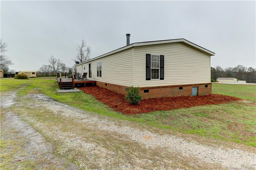 687 Fayette Road York, SC 29745 - Photo 43 of 48 a view of a house with a yard and sitting area