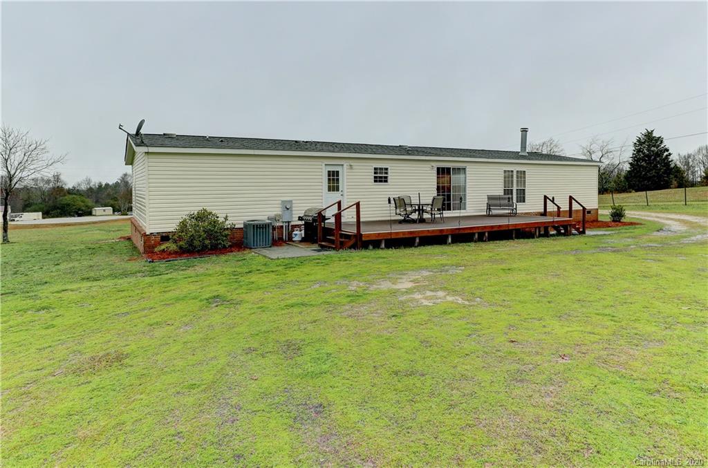 687 Fayette Road York, SC 29745 - Photo 45 of 48 a view of a house with a yard and sitting area