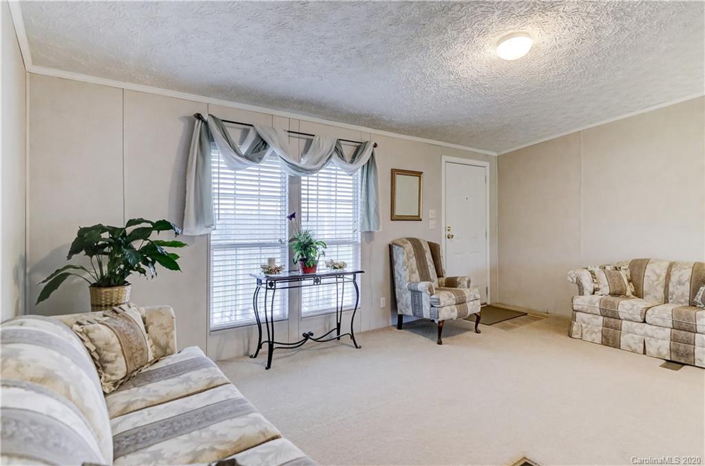 687 Fayette Road York, SC 29745 - Photo 8 of 48 a living room with furniture and a potted plant