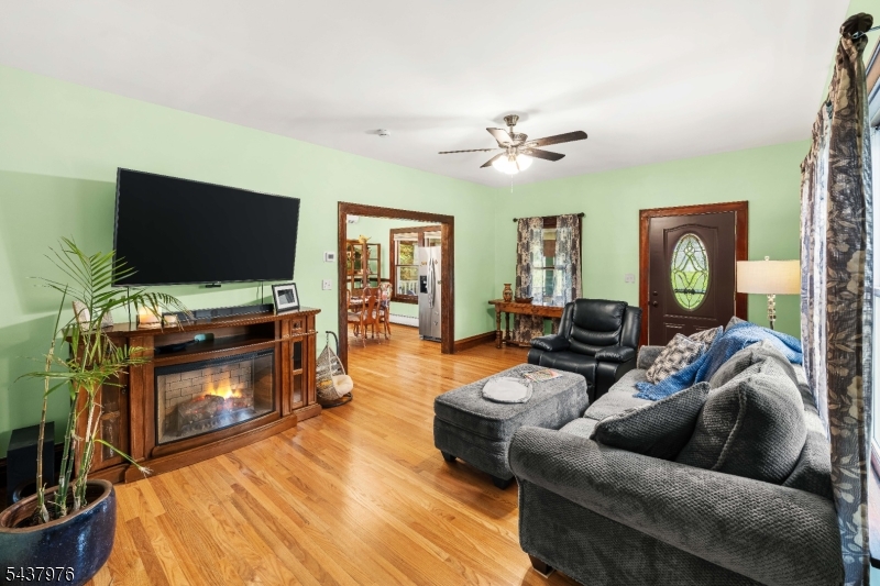 886 Brass Castle Road Belvidere, NJ 07823 - Photo 5 of 44 a living room with furniture and a flat screen tv