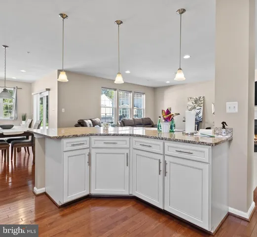 a utility room with sink dryer and washer