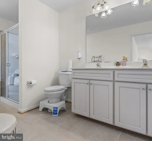 a living room with furniture and windows