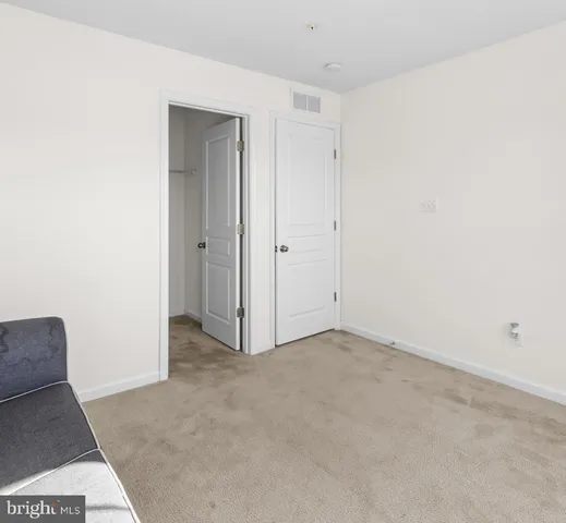 a bathroom with a sink double vanity and a mirror