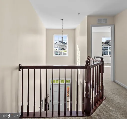 a bedroom with a bed and furniture