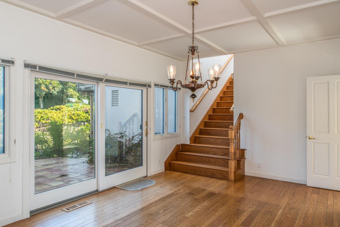 3049 Cormorant Road Pebble Beach, CA 93953 - Photo 21 of 42 a view of a room with wooden floor garden view and entryway
