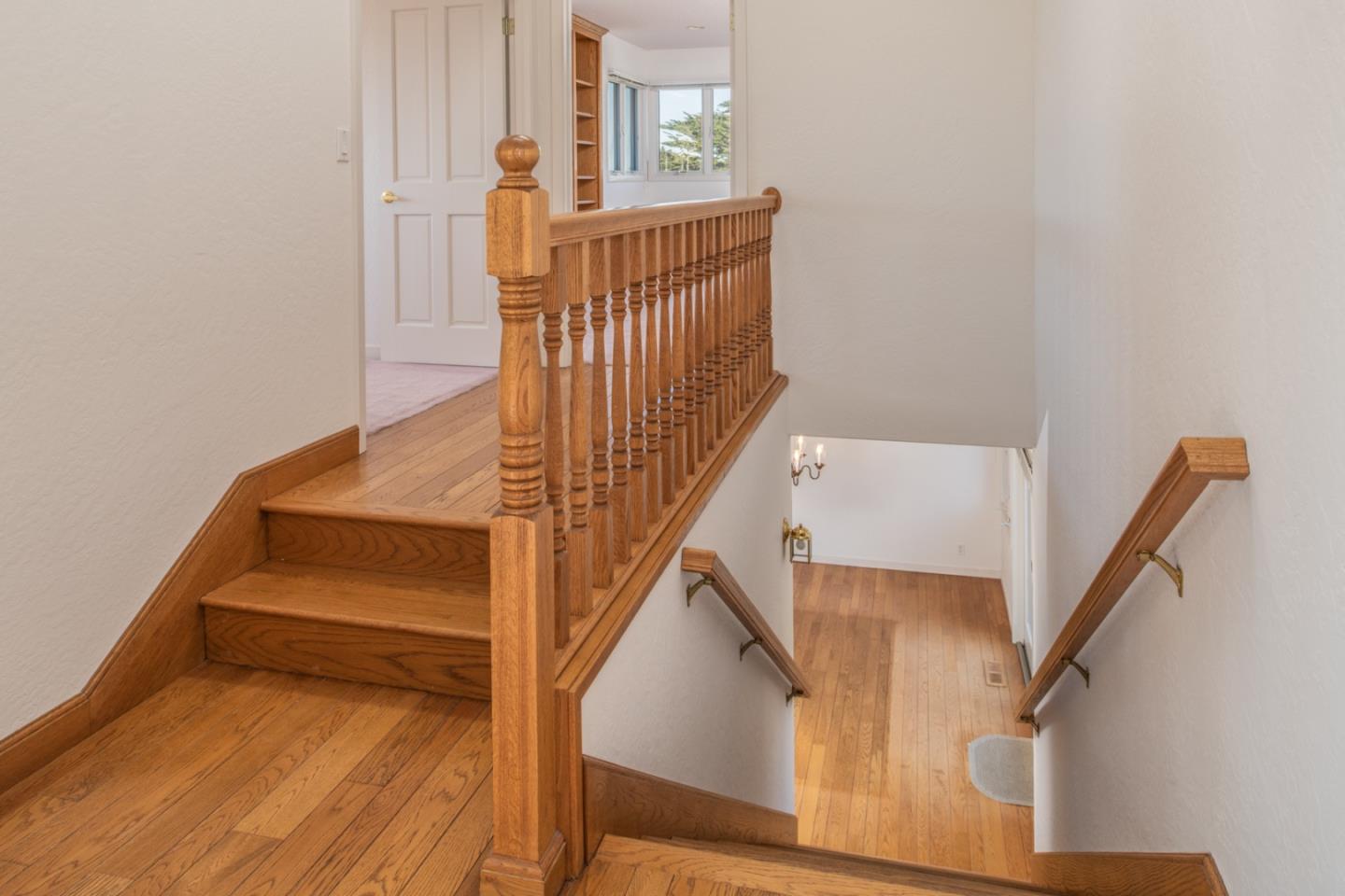3049 Cormorant Road Pebble Beach, CA 93953 - Photo 23 of 42 a view of entryway and hall with wooden floor