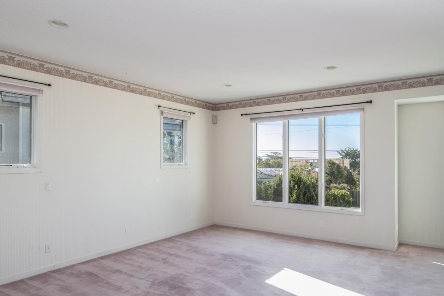 3049 Cormorant Road Pebble Beach, CA 93953 - Photo 25 of 42 a view of an empty room with a window