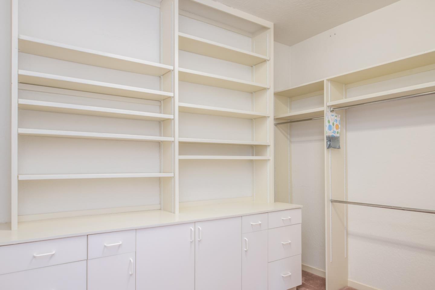 3049 Cormorant Road Pebble Beach, CA 93953 - Photo 34 of 42 a view of walk in closet with empty racks