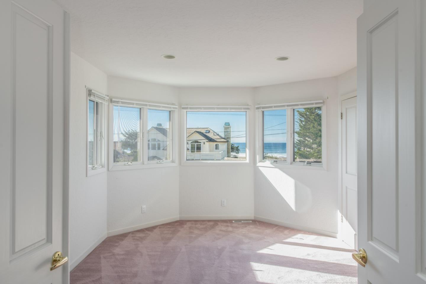 3049 Cormorant Road Pebble Beach, CA 93953 - Photo 35 of 42 a view of an empty room with a window