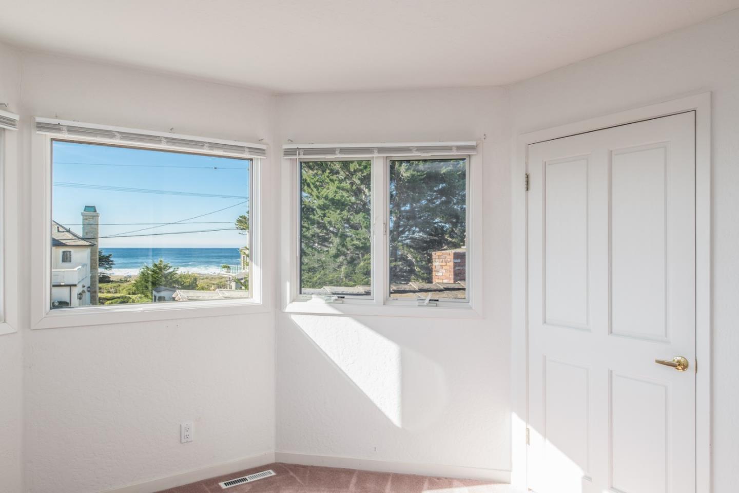 3049 Cormorant Road Pebble Beach, CA 93953 - Photo 36 of 42 a view of an empty room with a window