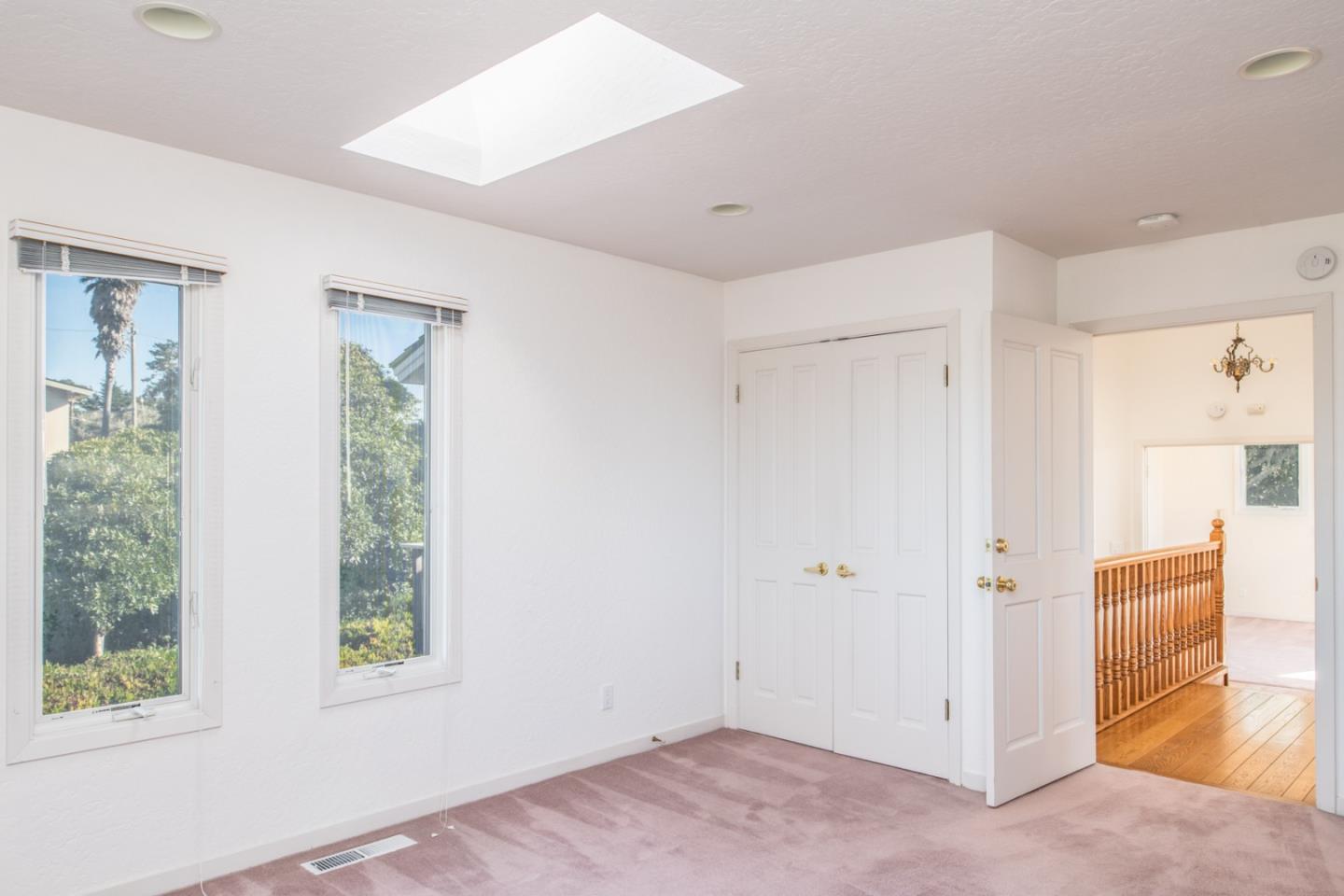 3049 Cormorant Road Pebble Beach, CA 93953 - Photo 40 of 42 a view of an empty room with a window