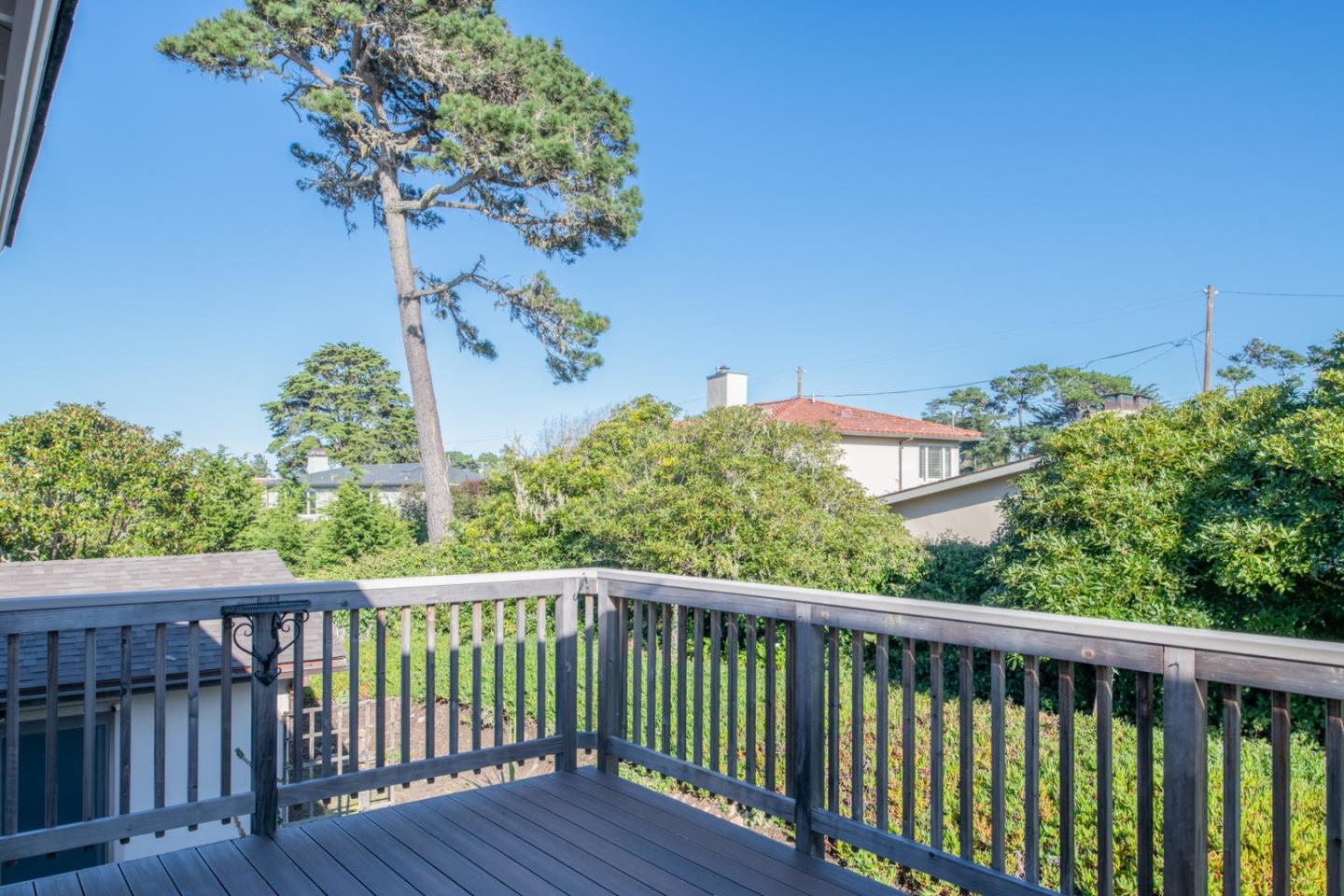3049 Cormorant Road Pebble Beach, CA 93953 - Photo 41 of 42 a view of a balcony with wooden fence