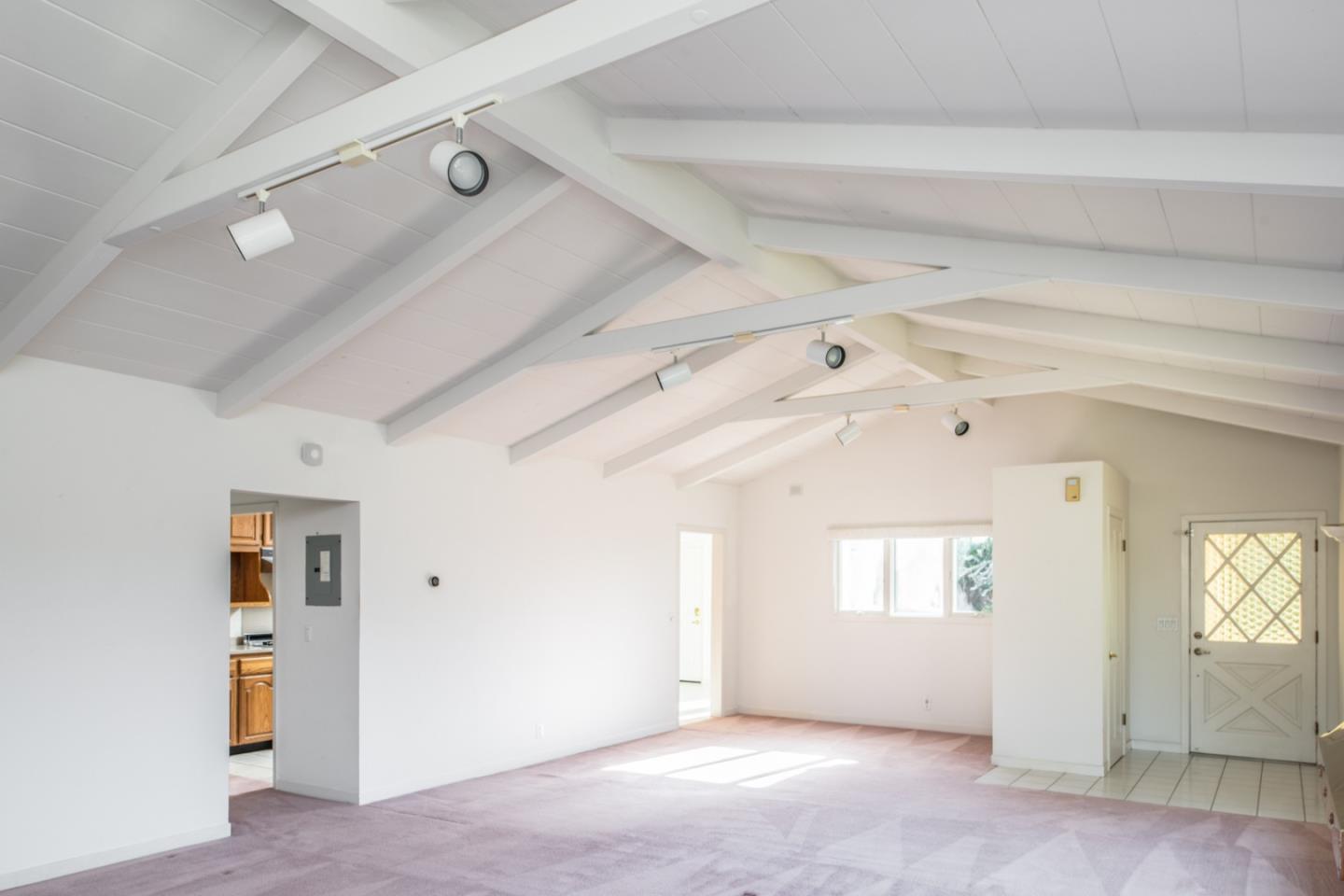 3049 Cormorant Road Pebble Beach, CA 93953 - Photo 9 of 42 a view of a big room with closet and windows
