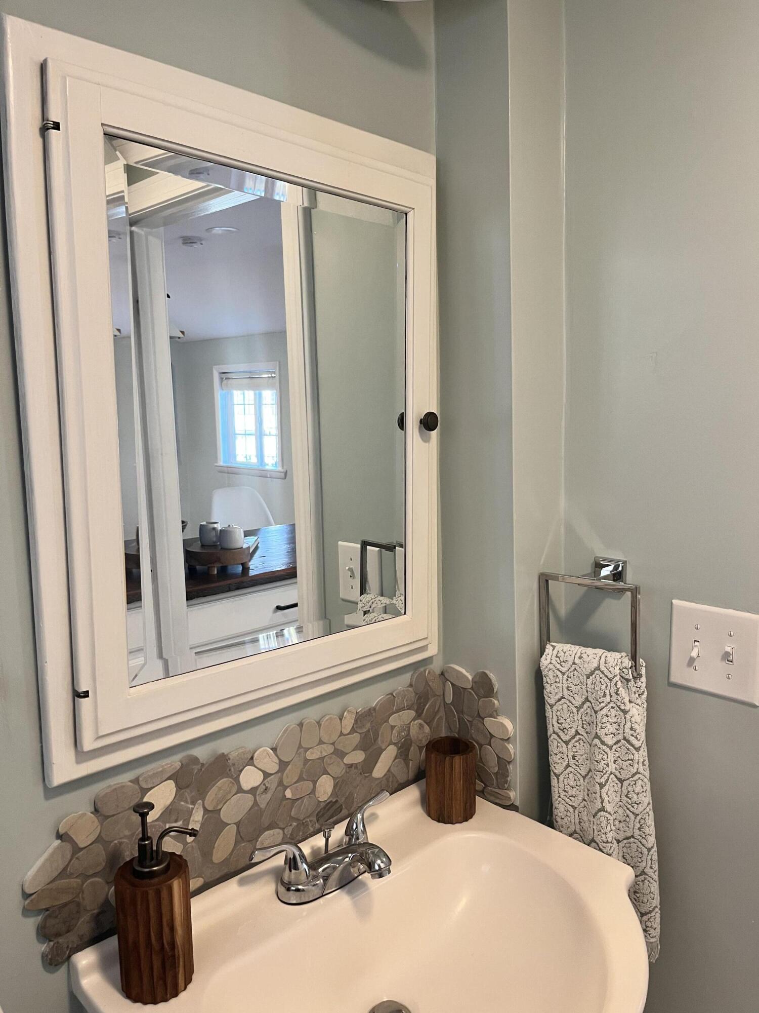 8 Trinity Lane Wareham, MA 02571 - Photo 11 of 49 a bathroom with a sink and a mirror