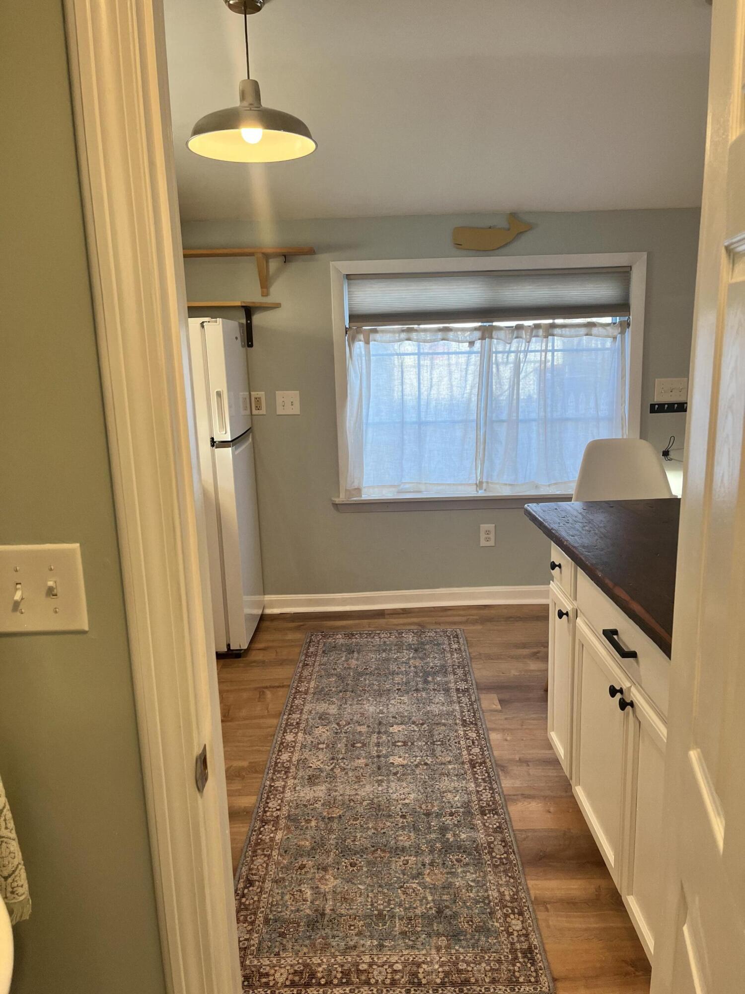 8 Trinity Lane Wareham, MA 02571 - Photo 20 of 49 a bathroom with a sink a mirror and a shower
