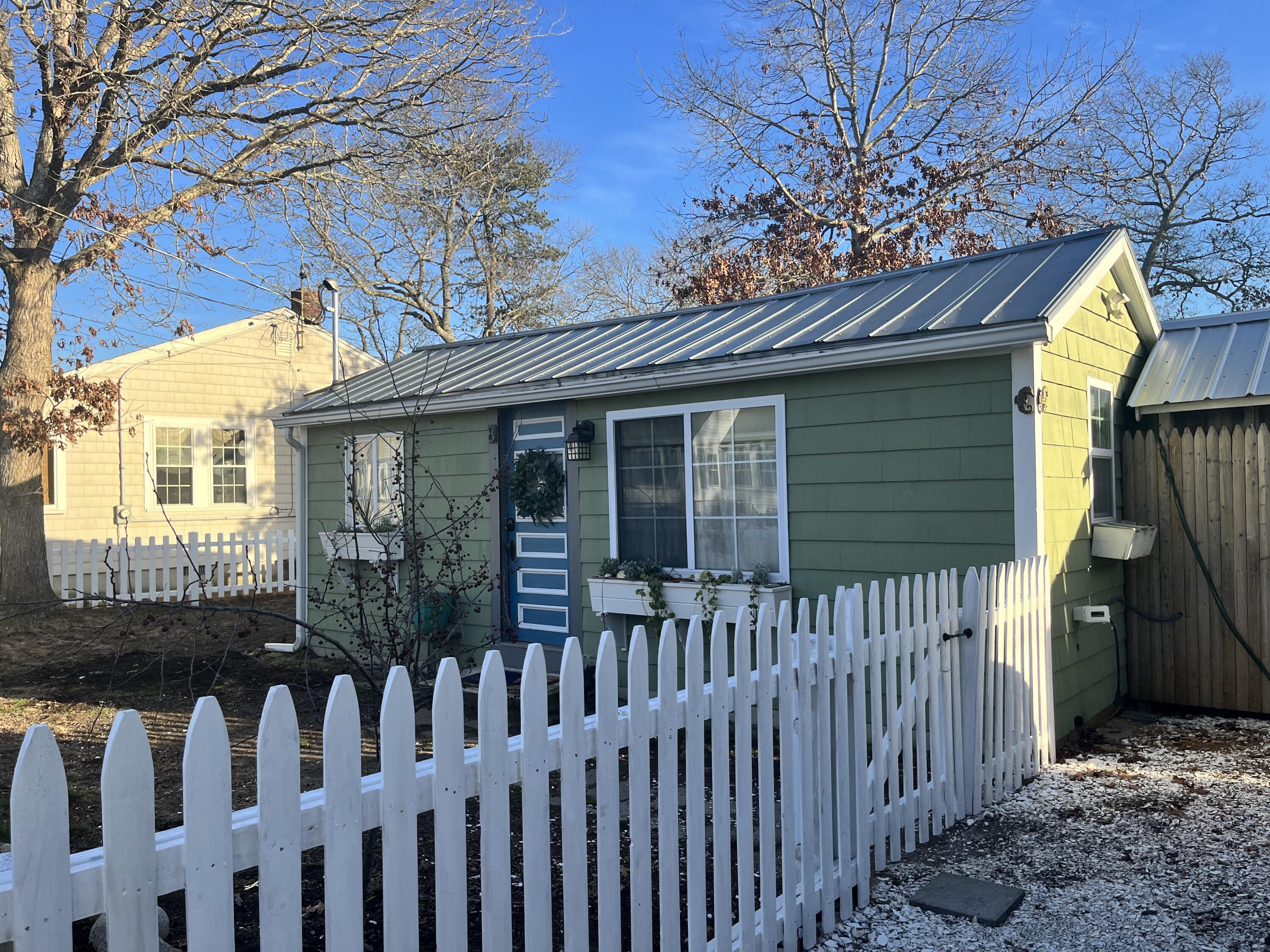 8 Trinity Lane Wareham, MA 02571 - Photo 41 of 49 a view of a house with a small yard