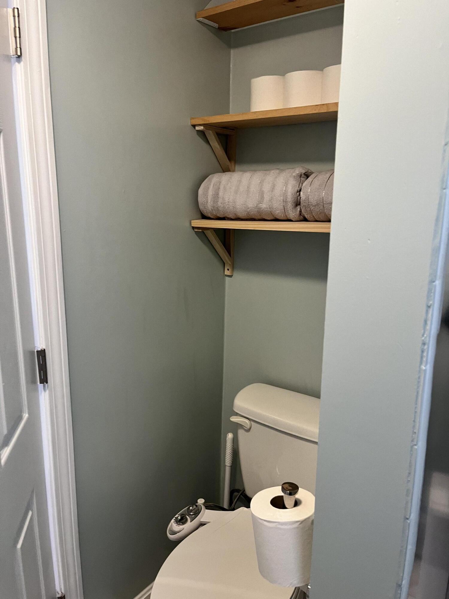 8 Trinity Lane Wareham, MA 02571 - Photo 9 of 49 a bathroom with a toilet and a sink