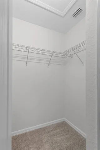 a view of a room with racks on the wall