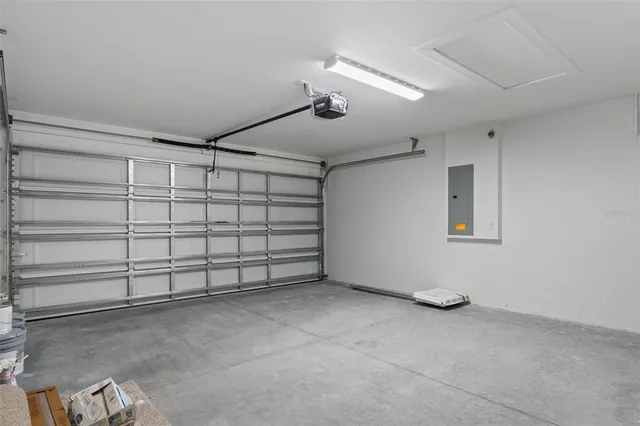 a view of a room with air conditioner and a window