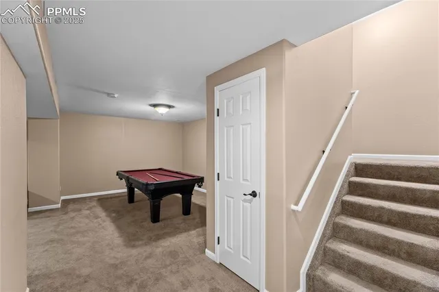 a view of a hallway with staircase