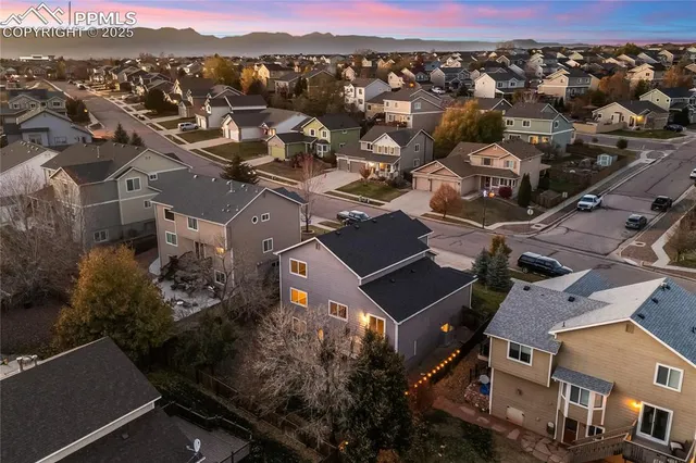 an aerial view of a city with lots of residential buildings