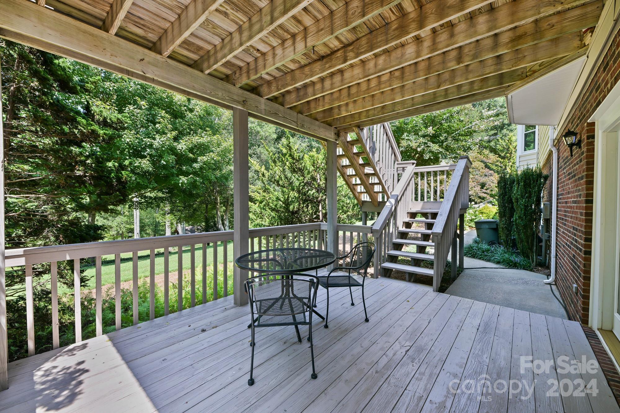 1135 Arabian Farm Road Clover, SC 29710 - Photo 30 of 48 a view of a chairs and table in the balcony