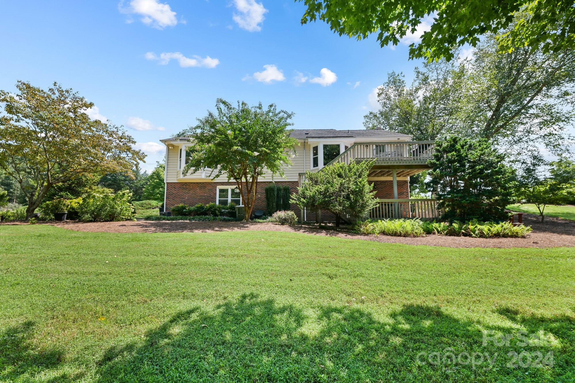 1135 Arabian Farm Road Clover, SC 29710 - Photo 31 of 48 a front view of a house with a yard and trees