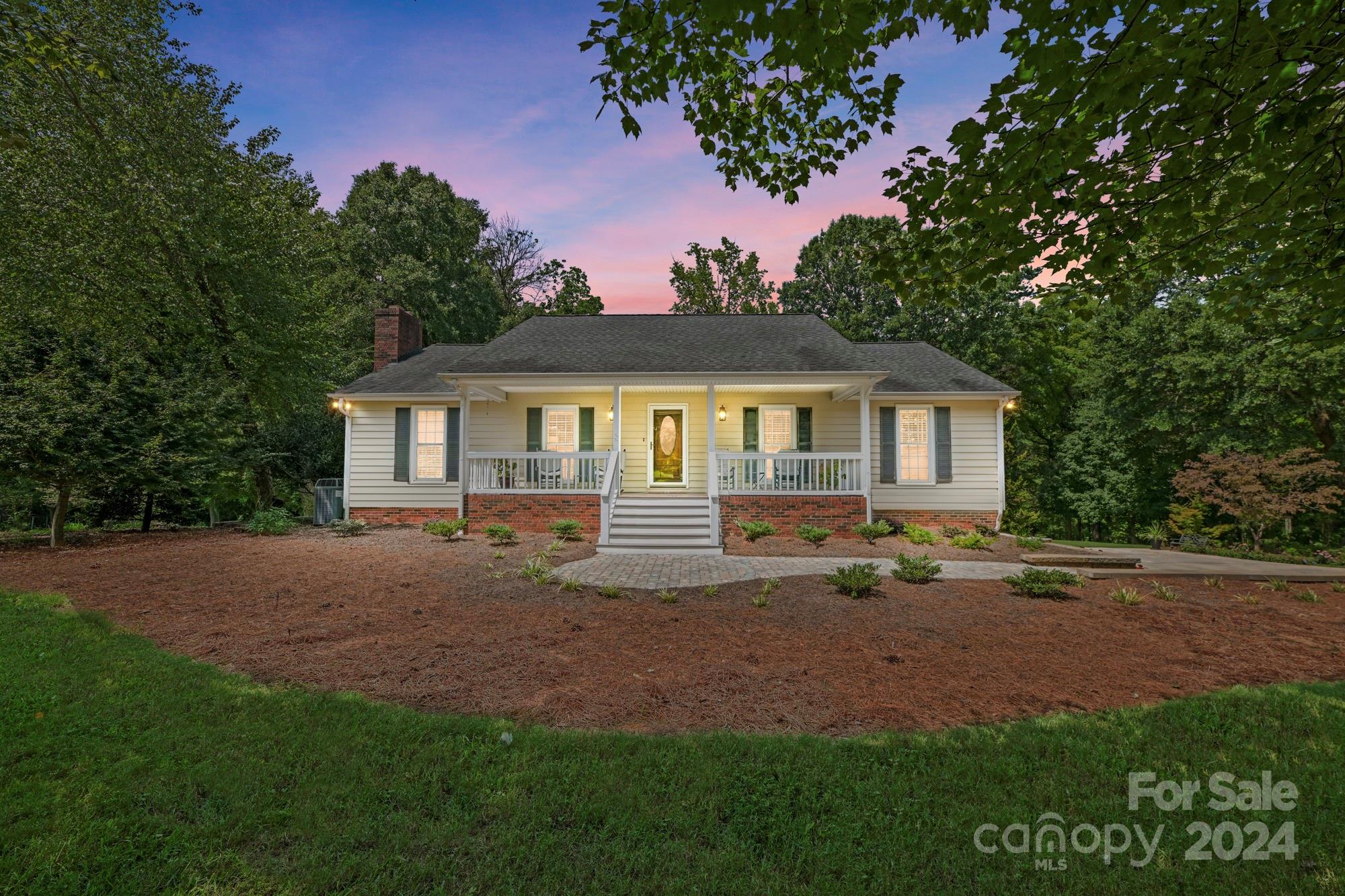 1135 Arabian Farm Road Clover, SC 29710 - Photo 48 of 48 a front view of a house with a garden and yard