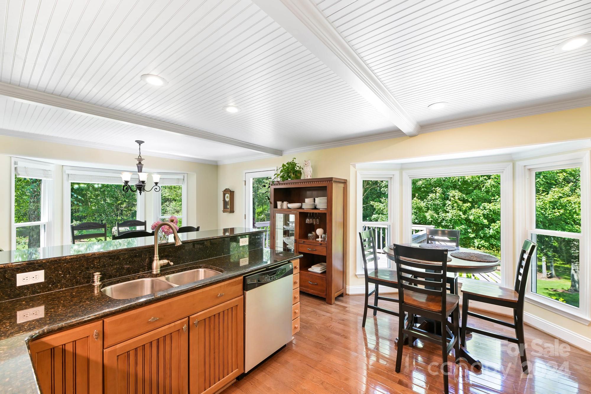 1135 Arabian Farm Road Clover, SC 29710 - Photo 10 of 48 a kitchen with granite countertop lots of counter top space and dining table