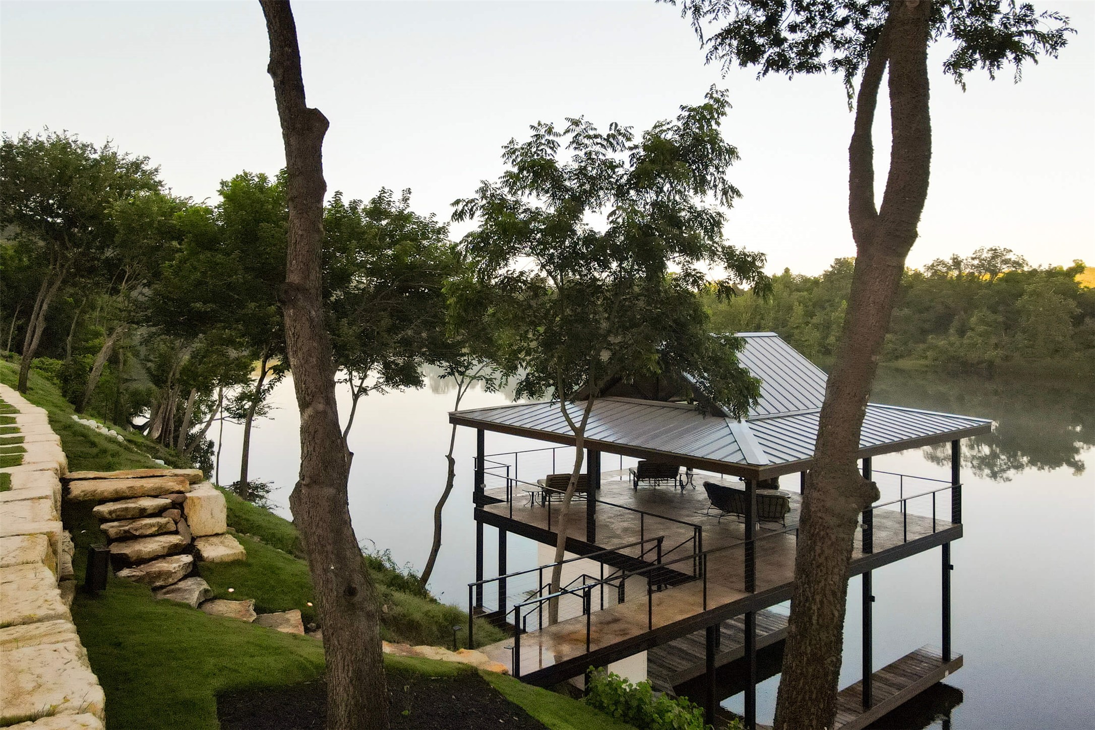 15016 Flat Top Ranch Road Austin, TX 78732 - Photo 18 of 40 Dock area featuring a water view