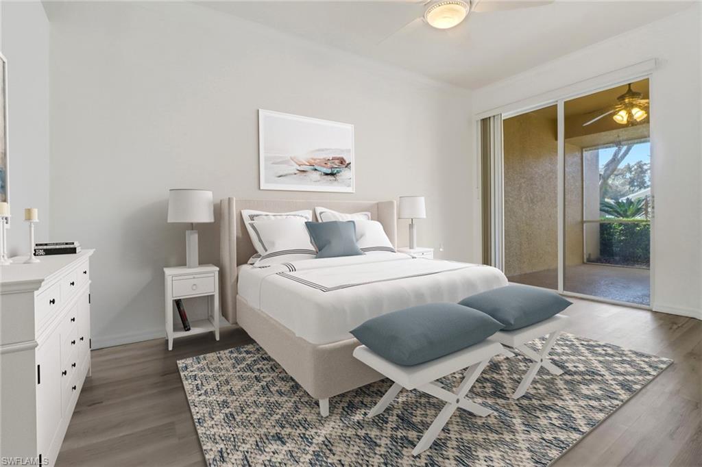 1677 Morning Sun Lane Naples, FL 34119 - Photo 16 of 41 a bedroom with a bed and wooden floor