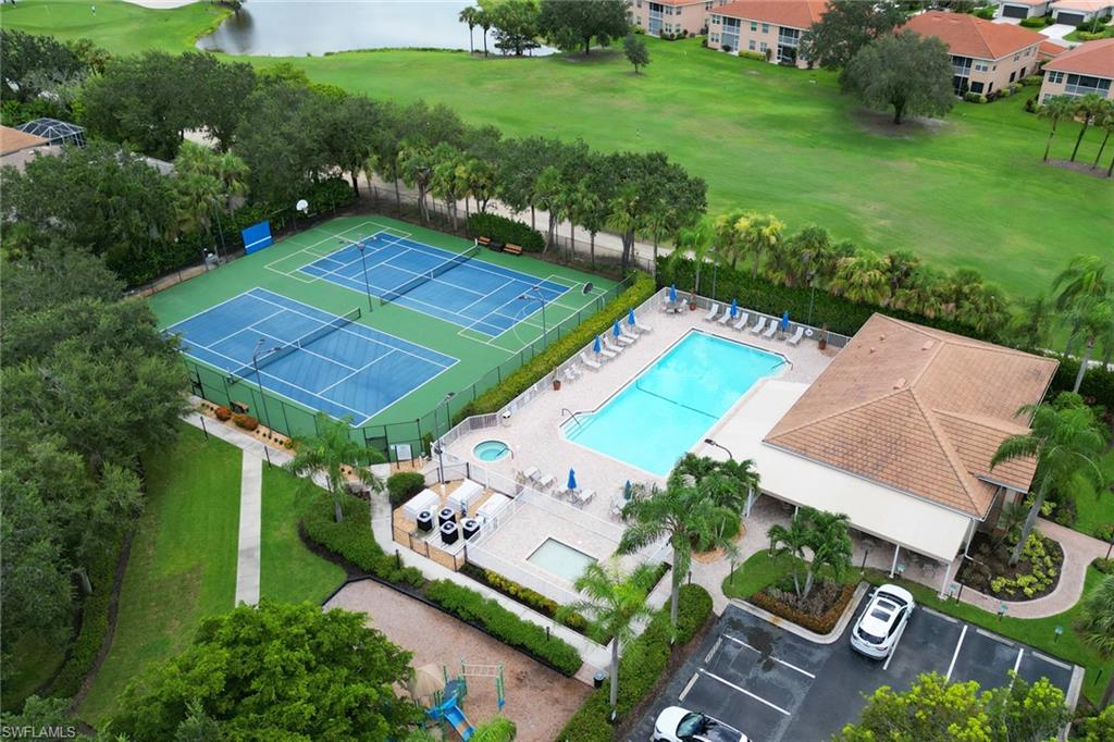 1677 Morning Sun Lane Naples, FL 34119 - Photo 31 of 41 an aerial view of a house