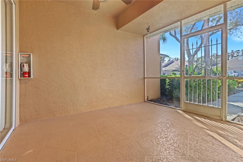 1677 Morning Sun Lane Naples, FL 34119 - Photo 4 of 41 a view of a room with a large window