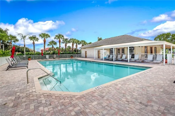 a view of a house with swimming pool