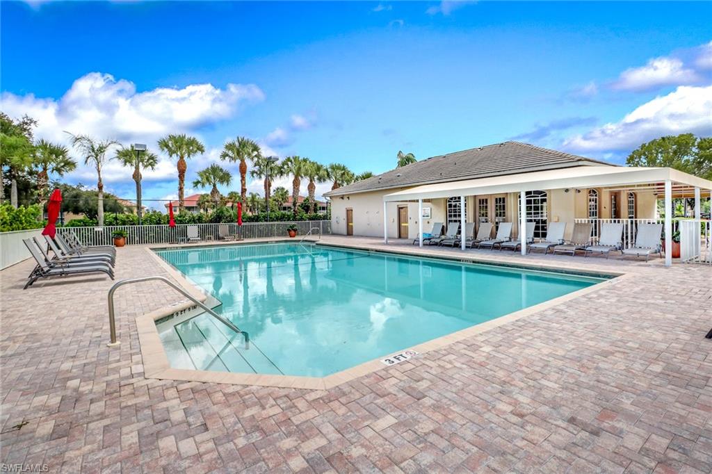 1677 Morning Sun Lane Naples, FL 34119 - Photo 41 of 41 a view of a house with swimming pool